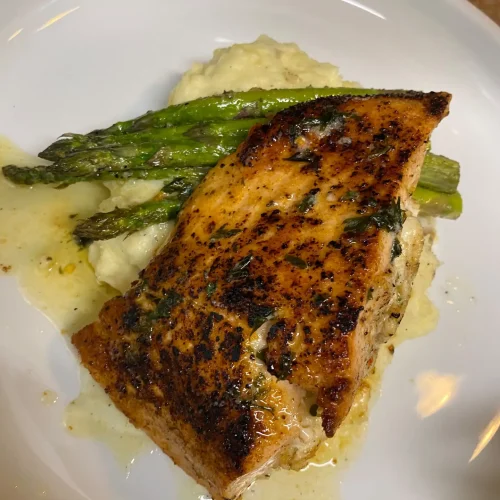 Pan-seared salmon with mashed potatoes and asparagus