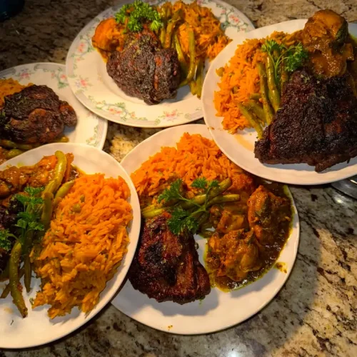 Seasoned chicken with yellow rice and green beans